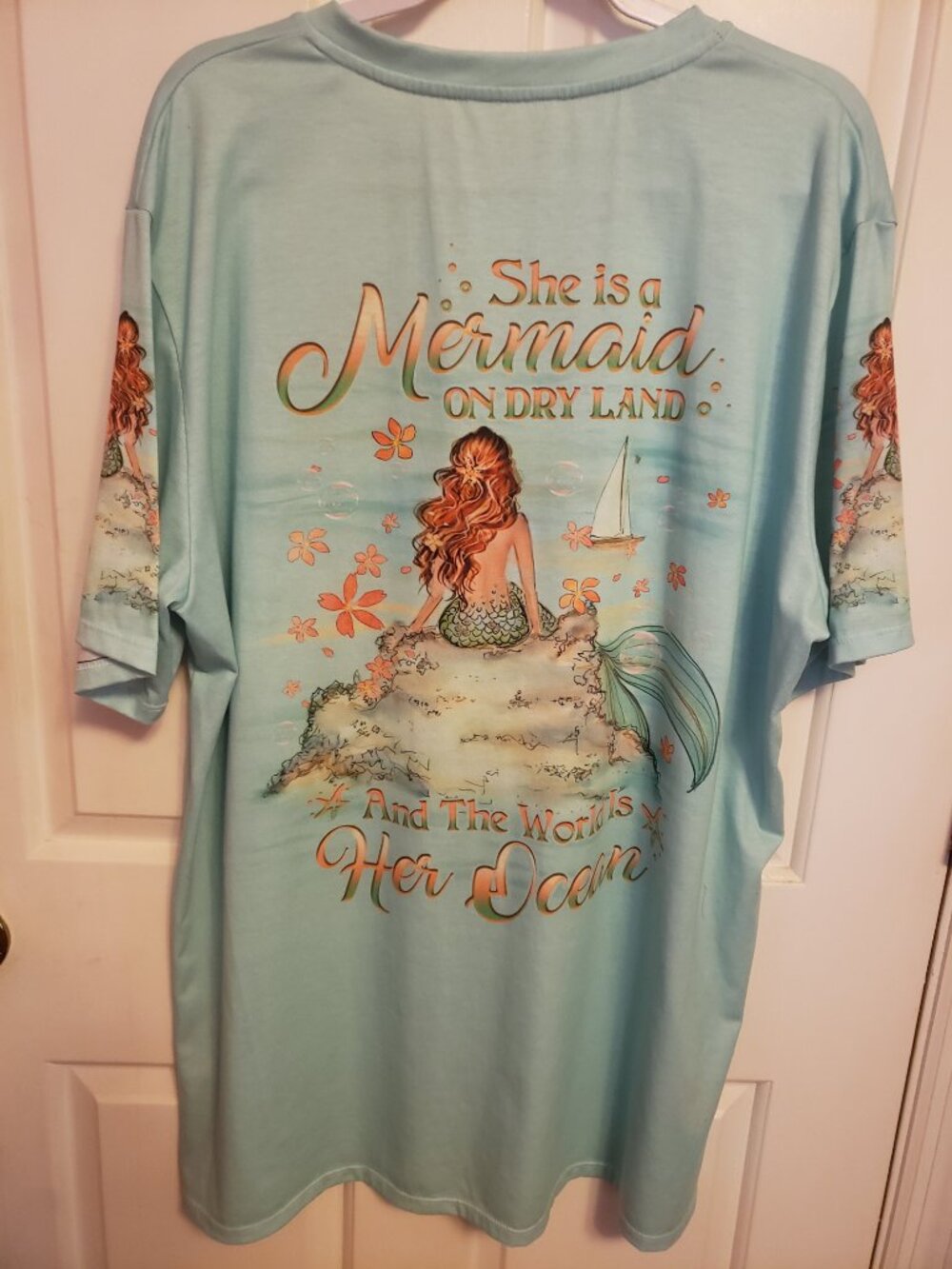 Mermaid tshirt design on front and back.